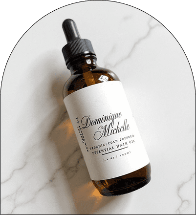 Brown bottle of essential hair oil.